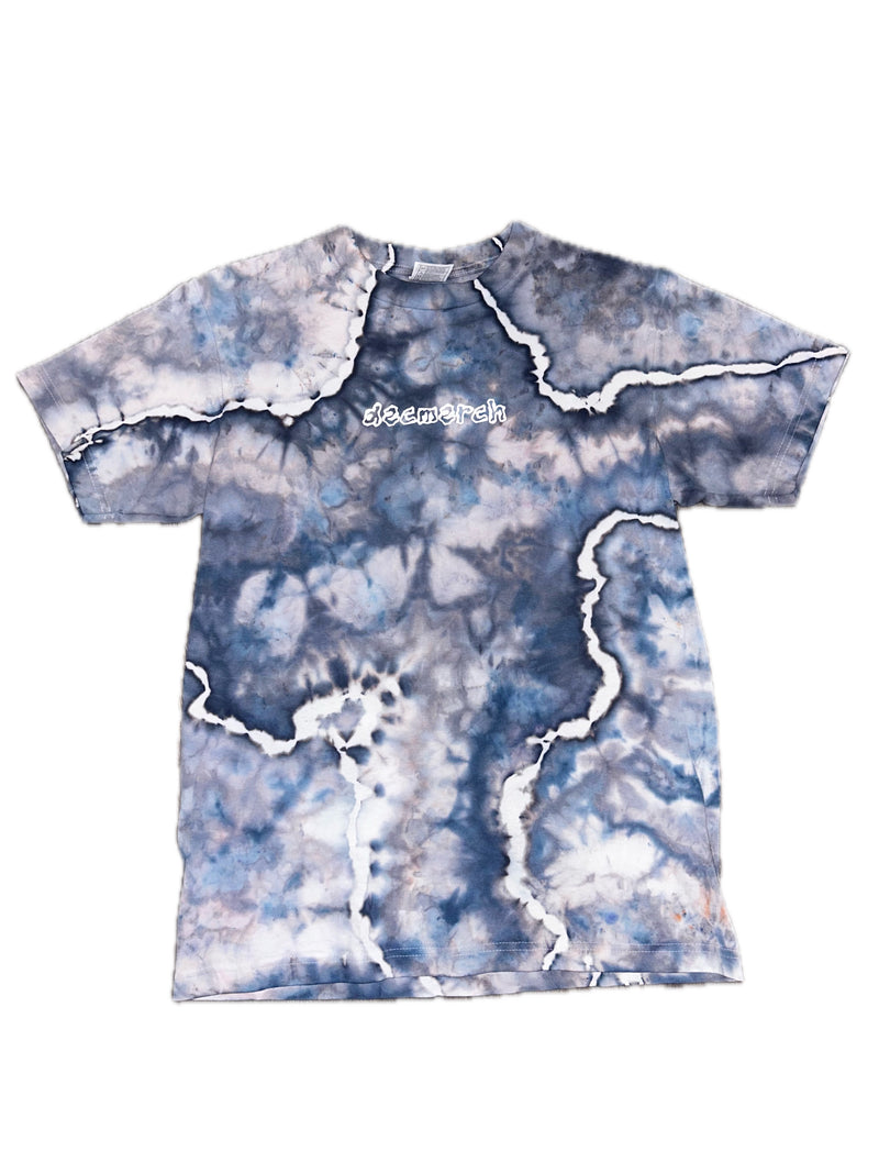 Dec Merch Storm Clouds geode tee product photograph